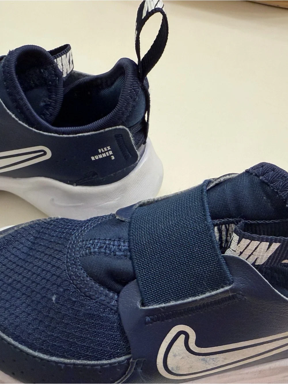 Nike Kids Navy and White Flex Runner Slip-On Sneaker